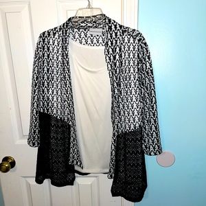 Ladies jacket with shell. 3/4 sleeve. Light weight.